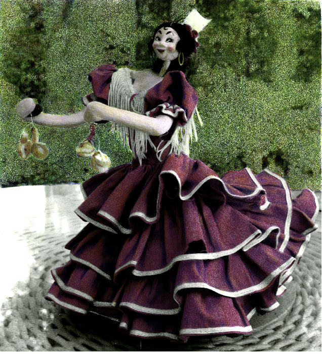 Doll wearing ruffled maroon dress