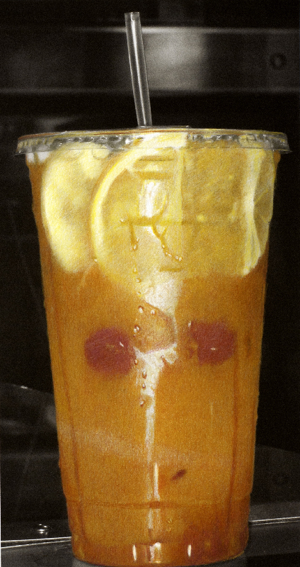 glass of orangeade with a face