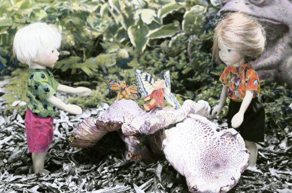 wooden dolls visiting with fairy bears in a fairy mushroom ring