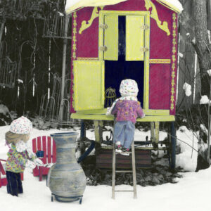 wooden dolls at their caravan in the snow
